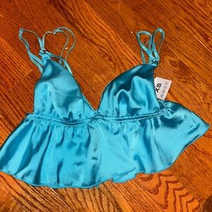 Blue satin crop top with ruffles